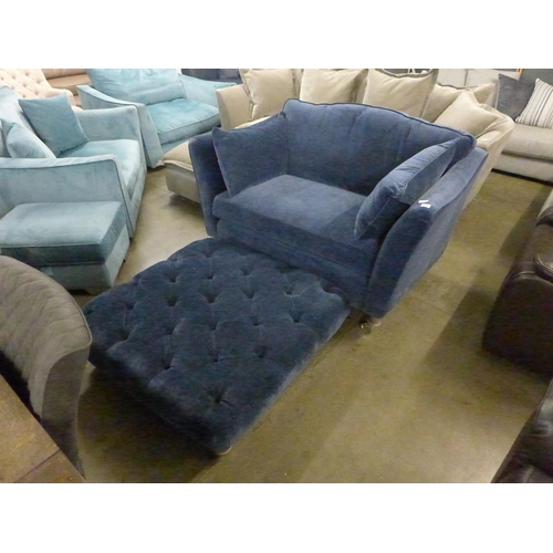 1380 - A blue velvet loveseat and buttoned footstool