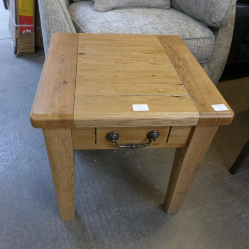 1412 - An oak lamp table * this lot is subject to VAT
