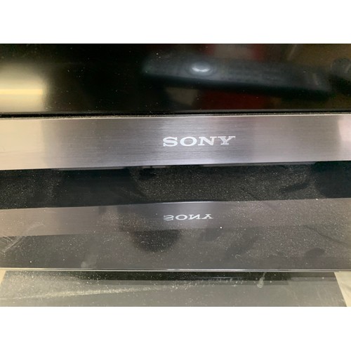 2214 - Sony 32EX53 colour TV plus remote control, DVD recorder & glass stand