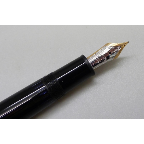 1011 - A Mont Blanc Meisterstuck fountain pen with 14k gold nib, CX1130965, a Sheaffer fountain pen and a P... 