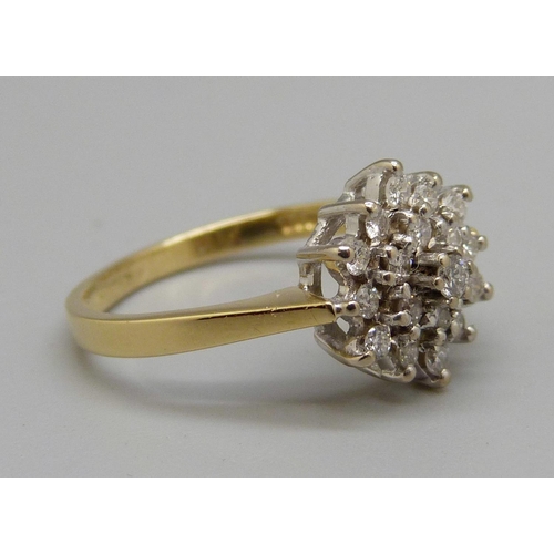 1012 - An 18ct gold and diamond cluster ring, 0.5ct diamond weight, 3.5g, M