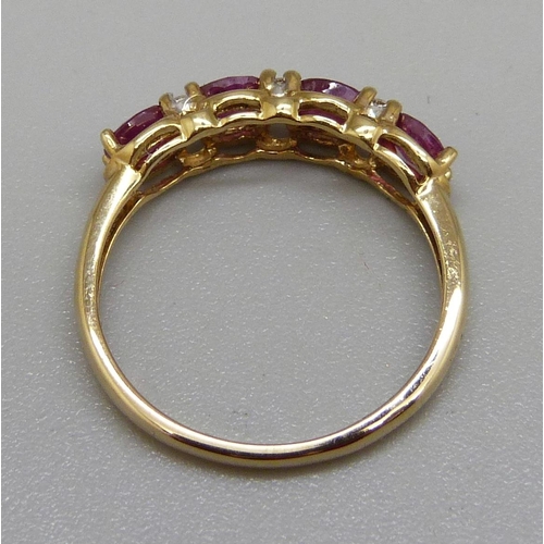 1013 - A 9ct gold, ruby and diamond ring, 1.5g, L