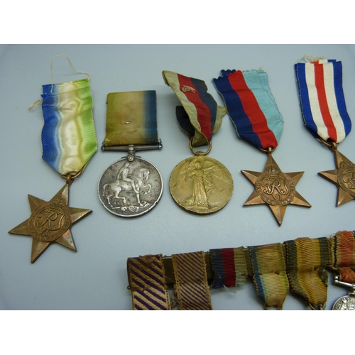 1041 - A pair of WWI medals to 7-4551 Pte. H. Lock North'd Fus., rims a/f, five WWII medals and a medal min... 