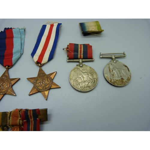 1041 - A pair of WWI medals to 7-4551 Pte. H. Lock North'd Fus., rims a/f, five WWII medals and a medal min... 