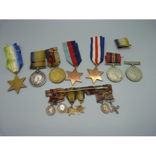 1041 - A pair of WWI medals to 7-4551 Pte. H. Lock North'd Fus., rims a/f, five WWII medals and a medal min... 