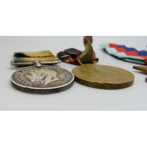 1041 - A pair of WWI medals to 7-4551 Pte. H. Lock North'd Fus., rims a/f, five WWII medals and a medal min... 