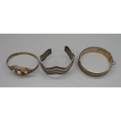 1046 - Three hallmarked silver bangles, 78g