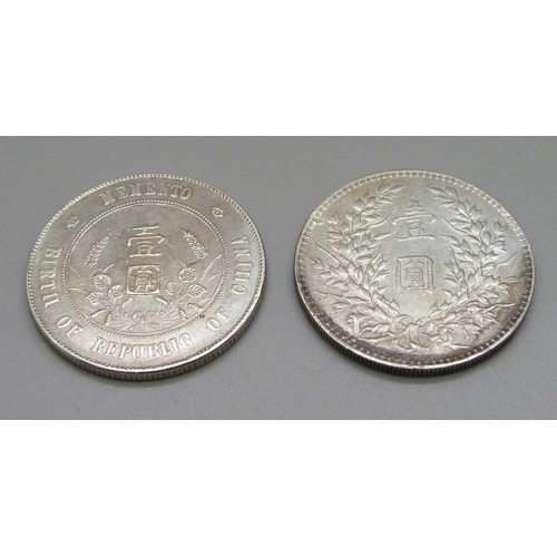 1074 - Two silver Chinese commemorative coins, 27g and 26.5g