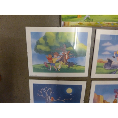 1099 - A set of four framed Walt Disney Winnie The Pooh prints with folder, Pooh's Grand Adventure, The Sea... 