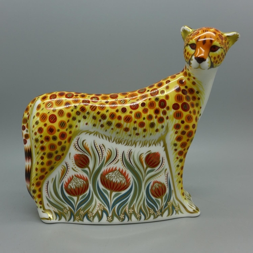 623 - A Royal Crown Derby cheetah paperweight with gold stopper