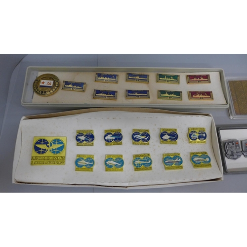 649 - A collection of Soviet era Russian badges; Naval, Aeroflot and 'Hero City' plus a cased set of medal... 