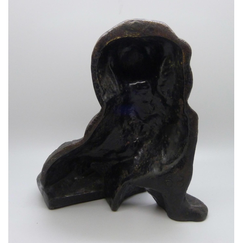 665 - An Edwardian cast iron door stop in the form of a spaniel dog, maker W. Bullock & Co., numbered 68, ... 