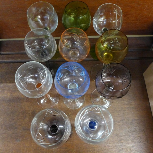 669 - A collection of eleven hock glasses with coloured stems