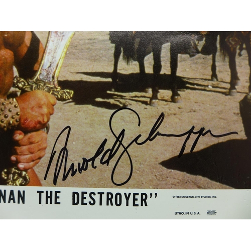 672 - Arnold Schwarzenegger signed lobby card - Conan The Destroyer
