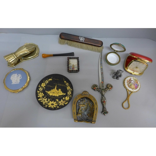 678 - A brass hand paper clip, travel clock, Stratton and Wedgwood compacts, etc.