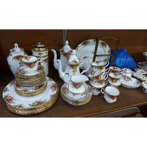 681 - A large collection of Royal Albert Old Country Roses, including five tea cups, seven coffee cups, tw... 