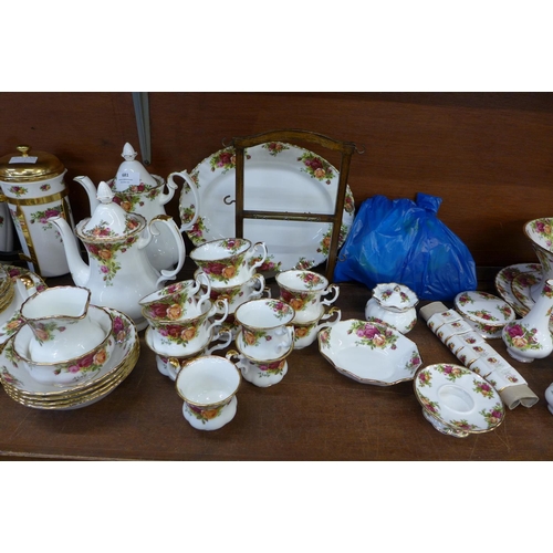 681 - A large collection of Royal Albert Old Country Roses, including five tea cups, seven coffee cups, tw... 