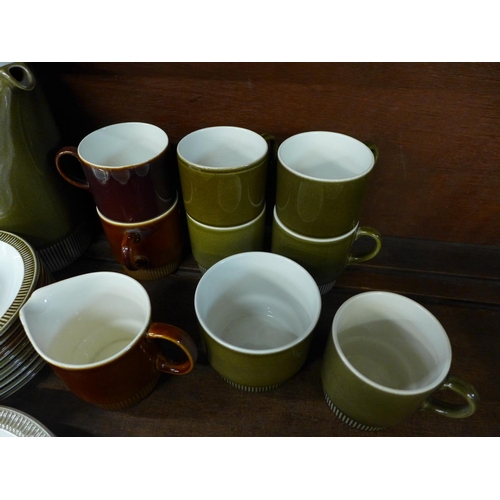 702 - A Poole coffee set - two colourways