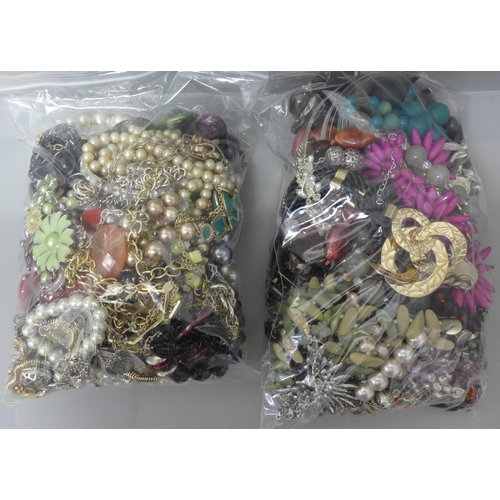 714 - Two bags of costume jewellery