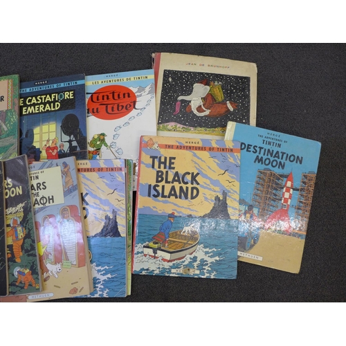 716 - Vintage books; Babar et le Pere Noel and seventeen Adventures of Tintin books