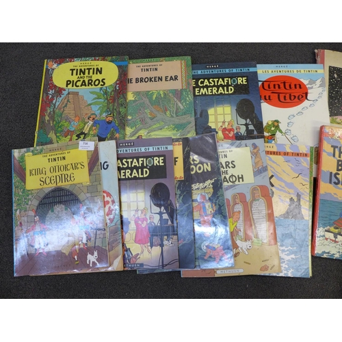 716 - Vintage books; Babar et le Pere Noel and seventeen Adventures of Tintin books