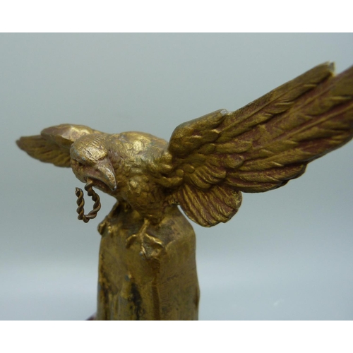 725 - A 1930's desk pocket watch holder, the gilt metal eagle with outstretched wings, on marble base, 17c... 