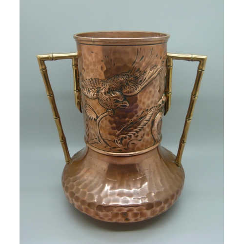 730 - A late 19th Century Arts and Crafts copper and brass twin-handled vase in the manner of Christopher ... 