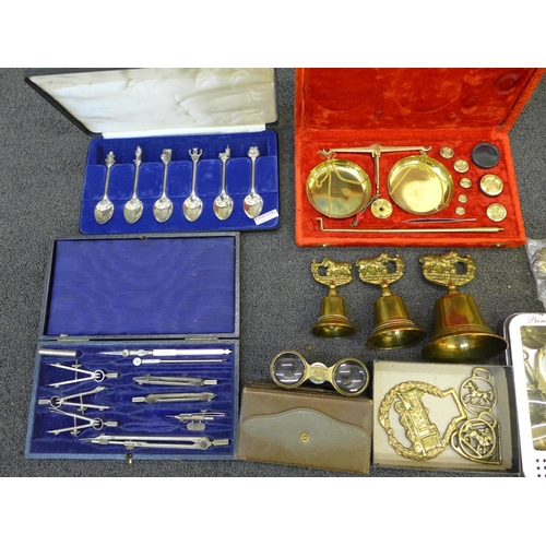 736 - A cased set of balance scales, two other scales, a cased drawing set, a pair of opera glasses marked... 
