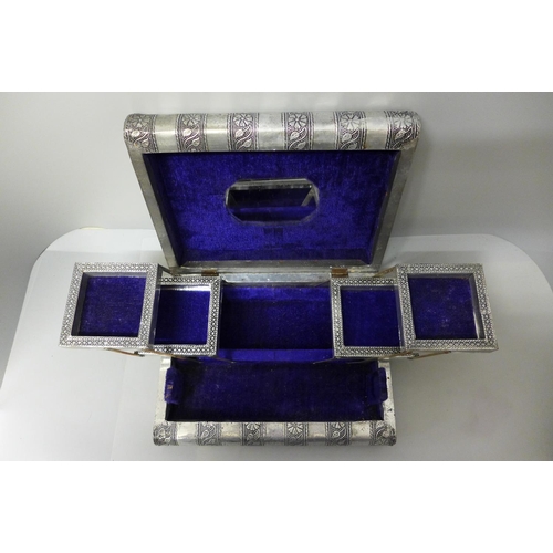 747 - An Indian silver bound jewellery box