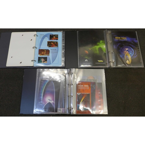 753 - Three folders of Star Trek phone cards