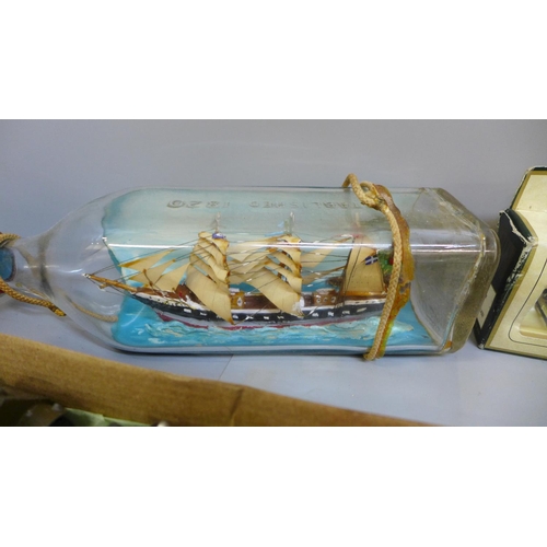 762 - Assorted model cars and a ship in a bottle