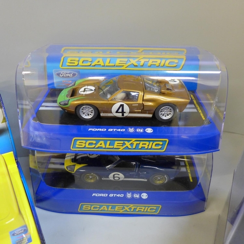 763 - Four Scalextric GT40 cars and two other model GT40 cars, all boxed