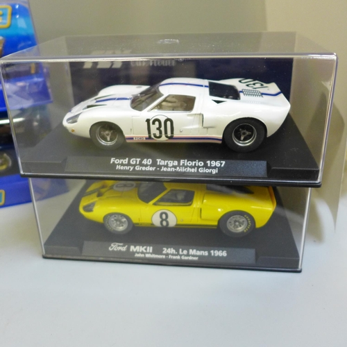 763 - Four Scalextric GT40 cars and two other model GT40 cars, all boxed