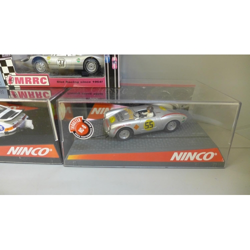 765 - Five Porsche slot car racing cars including three Ninco