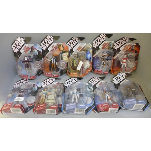 769 - Ten Hasbro Star Wars figures with Exclusive Collector coins, packaged