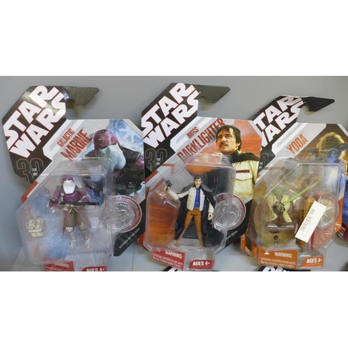 769 - Ten Hasbro Star Wars figures with Exclusive Collector coins, packaged