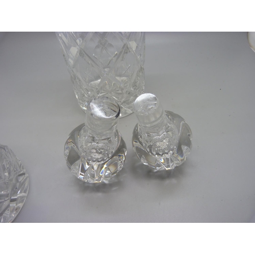 820 - A pair of silver mounted crystal glass decanters