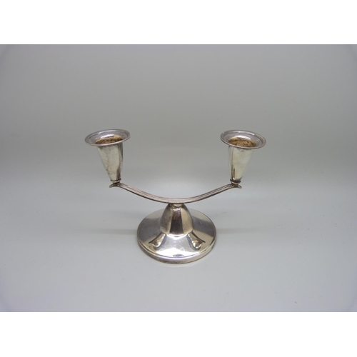 821 - A silver two branch candelabra, Birmingham 1958, Adie Bros., 10.5cm tall