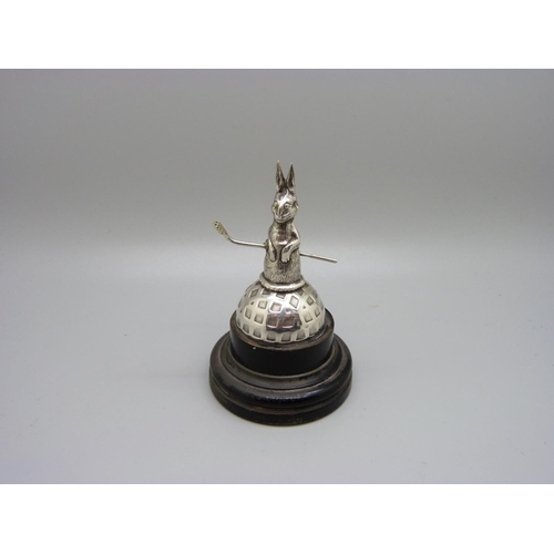 822 - A novelty silver golfing trophy, a double faced hare stood on a golf ball, Birmingham 1930, height 9... 