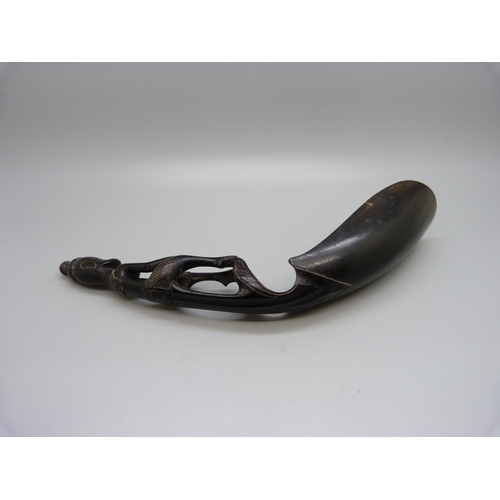 827 - A carved horn grain scoop