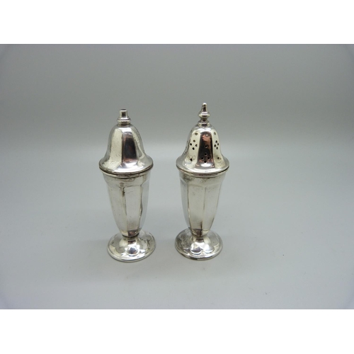 858 - A silver salt and pepper pair, by E. Viners, Sheffield marks, 87g