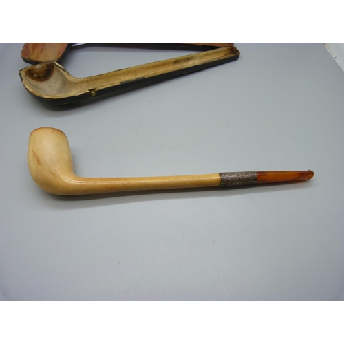 859 - A large Meerschaum pipe with amber and silver ferrule, cased, 24.5cm