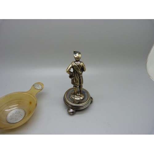 866 - A horn and white metal quaiche and a figure of a gentleman in Highland dress, figure 10.5cm