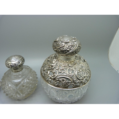 867 - Three silver mounted glass scent bottles, the largest hallmarked Birmingham 1898