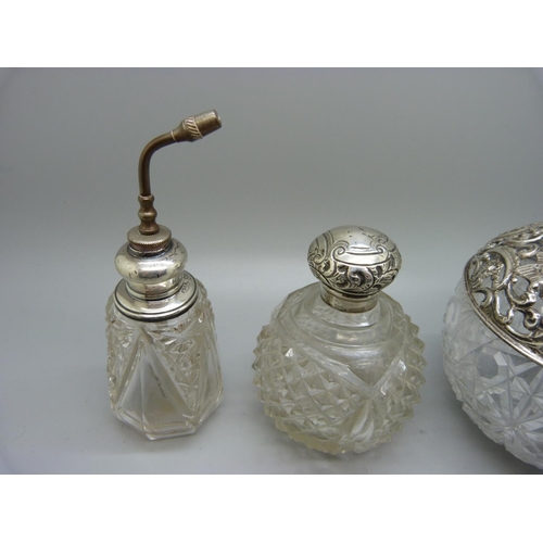 867 - Three silver mounted glass scent bottles, the largest hallmarked Birmingham 1898