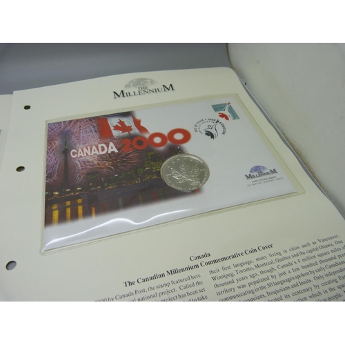 883 - Two The Millennium Coin Cover Series, United States one ounce fine silver dollar and Canada 9999 sil... 