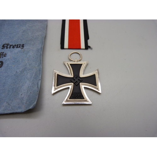 889 - A WWII German Iron Cross 2nd class with envelope