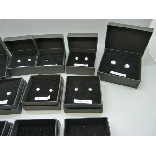 907 - Twelve pairs of silver earrings, boxed