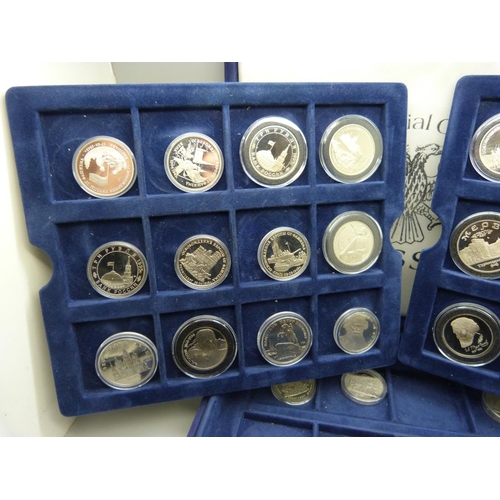 910 - A collection of 32 Russian proof coins with certificate of authenticity including 1 rouble, 3 rouble... 