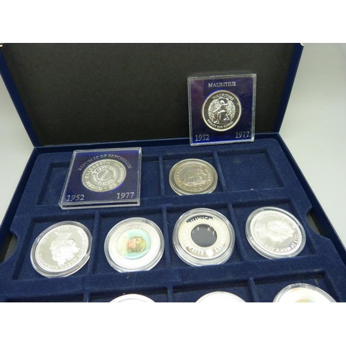 920 - A collection of eleven silver and silver proof crown sized coins including coins from Great Britain,... 